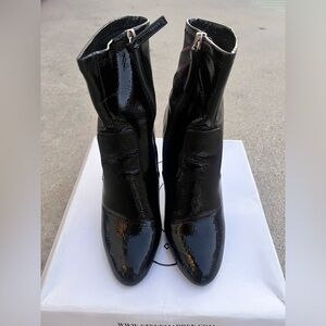 Black patent booties with clear heel